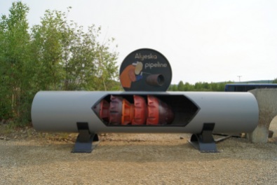 A cross section of the pipeline showing cleaners called pigs